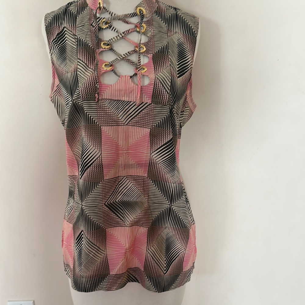 Michael Kors Pink and Black Sleeveless Blouse with Graphic Cut-Out Design.